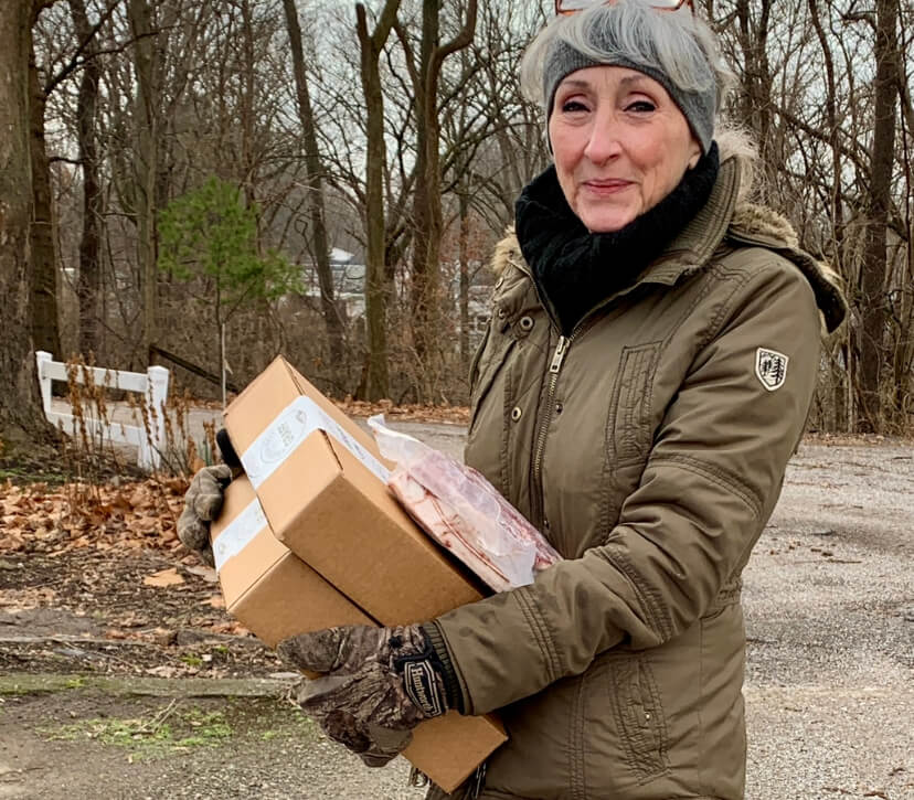 lady with beef gift box